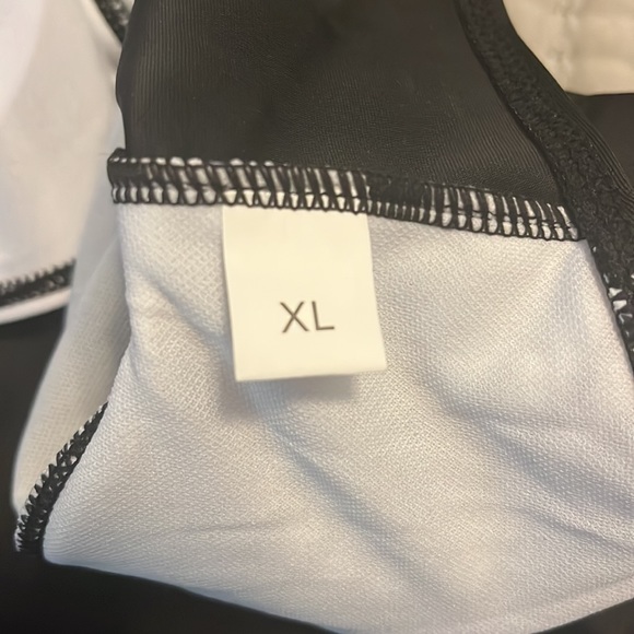 Black and white striped cross cross top, black bottom one piece in XL. - Picture 3 of 4